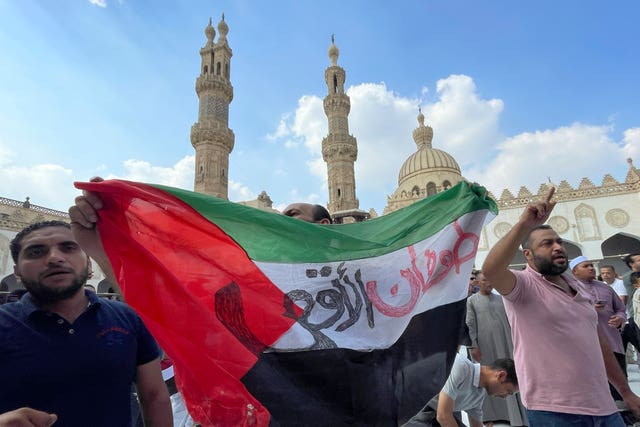 People leaving a mosque in Cairo