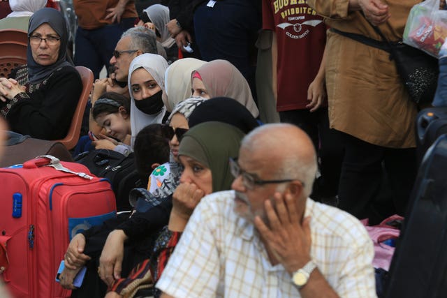 Palestinians wait at border crossing