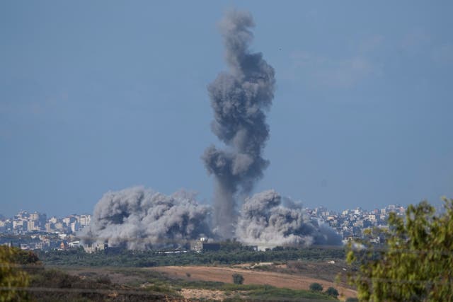 Smoke rises following an Israeli airstrike in the Gaza Strip 