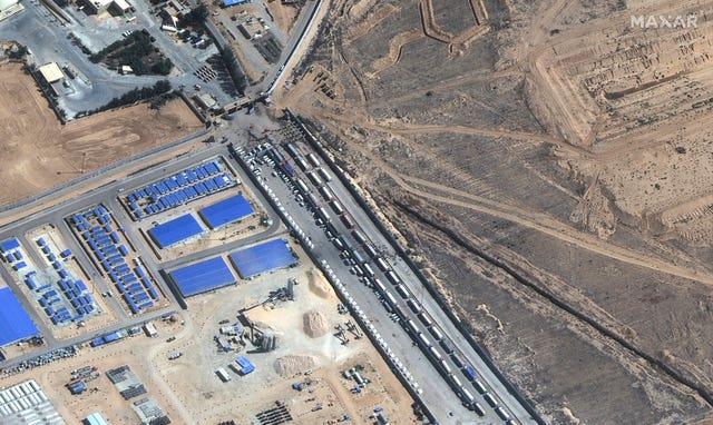 Aid trucks waiting on the Egyptian side of the Rafah border crossing