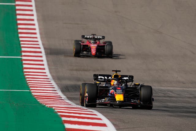 Red Bull's Max Verstappen, foreground, drives ahead of Ferrari's Charles Leclerc in the United States Grand Prix