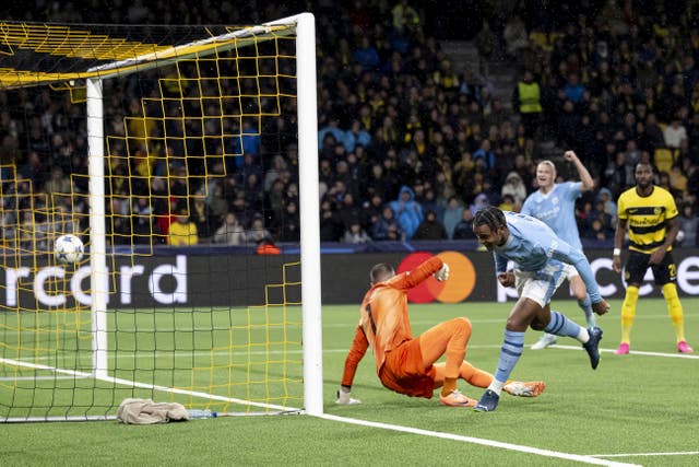 Manuel Akanji, right, slots home the opening goal against Young Boys on Wednesday 