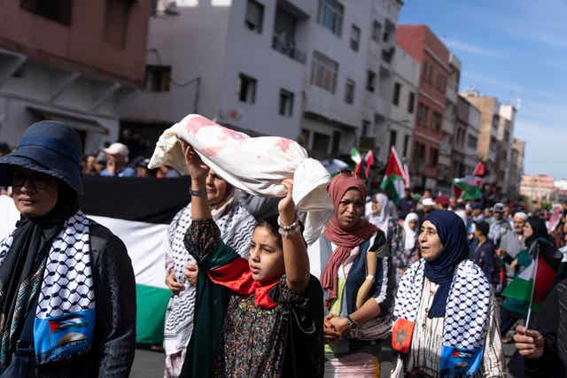 Thousands of Moroccans take part in a protest, in solidarity with Palestinians in Gaza and against normalisation with Israel, in Casablanca on Sunday