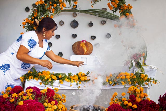 Ana Martinez prepares an altar on her home’s terrace in Santa Maria Atzompa