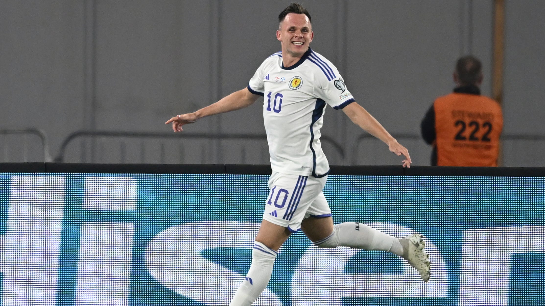 Lawrence Shankland celebrates Scotland’s late equaliser (Tamuna Kulumbegashvili/AP).