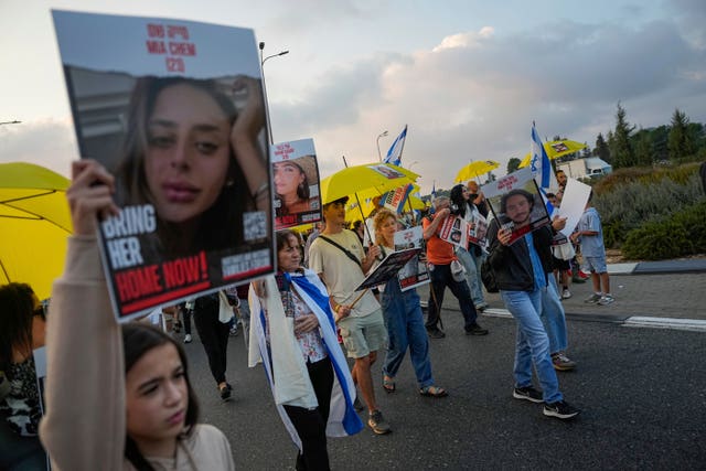 Families and friends of about 240 hostages held by Hamas in Gaza call for their return during a five-day march from Tel Aviv to the Prime Minister’s Office in Jerusalem