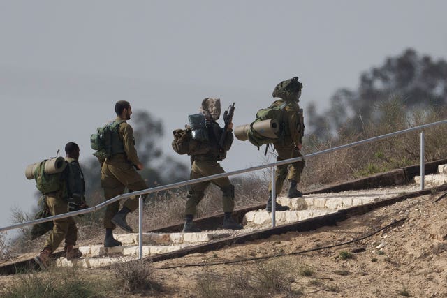 Israeli soldiers near the border with the Gaza Strip on Sunday