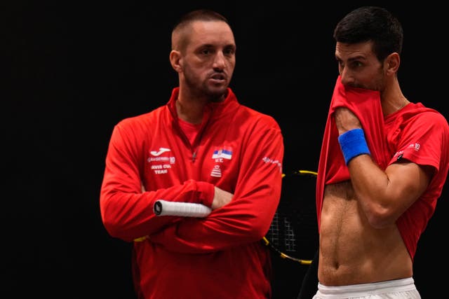 Novak Djokovic, right, with Serbia captain Viktor Troicki