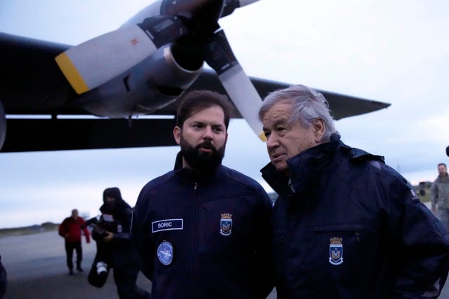 Chilean President Gabriel Boric (left) and UN general-secretary Antonio Guterres chat before taking a flight to Antarctica