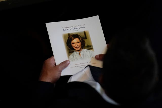 Attendees are seated before a tribute service for former first lady Rosalynn Carter at Glenn Memorial Church in Atlanta 