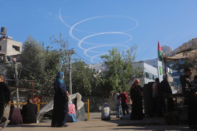 An Israeli warplane circles over Rafah on Thursday