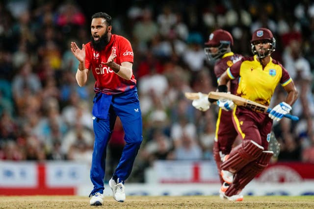 Adil Rashid  (left) in action for England