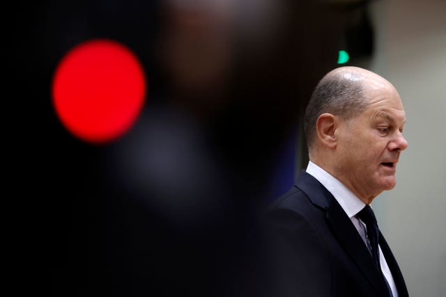 Germany’s Chancellor Olaf Scholz arrives for a round table meeting at an EU summit in Brussels on Friday