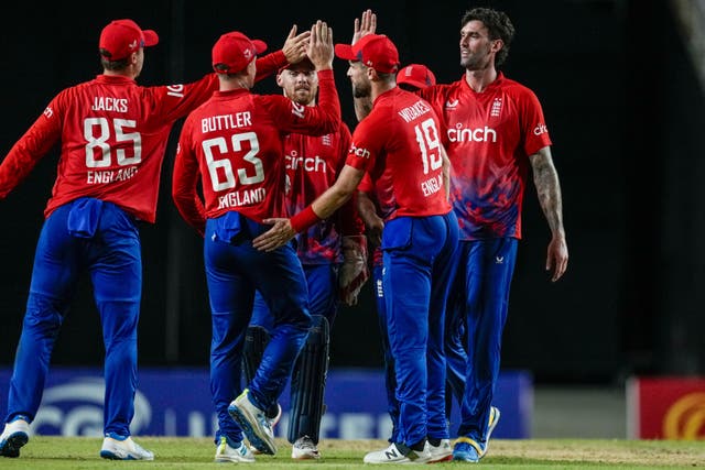 England celebrate the dismissal of the West Indies’ Matthew Forde