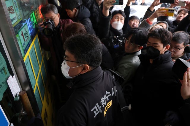 South Korea police at the office of the man who stabbed opposition leader Lee Jae-myung 