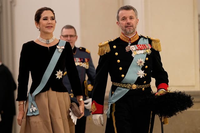 Denmark’s Crown Prince Frederik and Crown Princess Mary arrive to the traditional New Year’s fete at Christiansborg Castle in Copenhagen on Thursday 