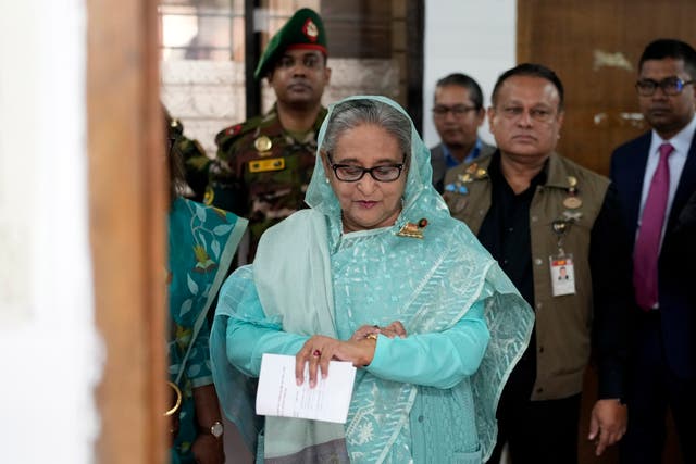 Sheikh Hasina checking her watch