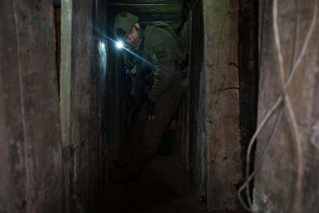 Israeli soldiers show journalists the tunnel 