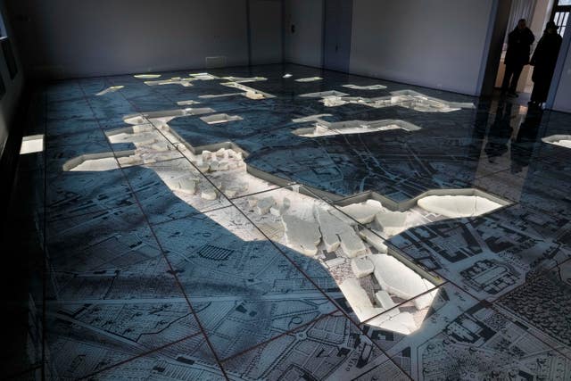 The giant marble map (Forma Urbis Romae) of ancient Rome is shown to the media in the Archaeological Park of Mount Celio Museum overlooking the Colosseum in Rome 