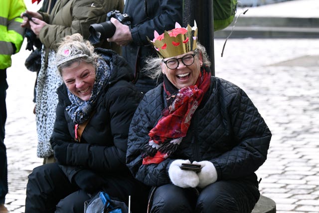 Susanne and Anette from Broendby wait for the royal procession at Christiansborg Slotsplads