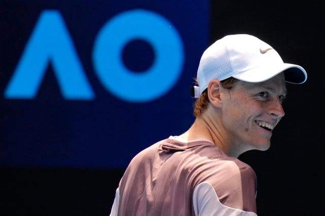 Jannik Sinner smiles during his first-round win over Botic Van De Zandschulp