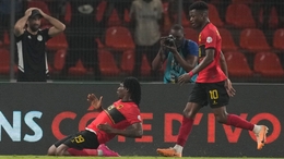 Angola’s Mabululu celebrates his equaliser against Algeria (Themba Hadebe/AP).