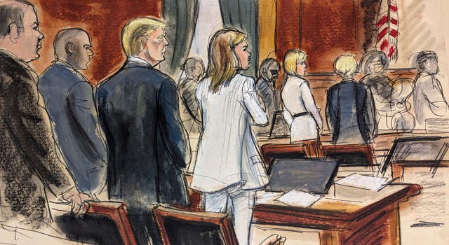 Prospective jurors file into the courtroom as Donald Trump, third left, stands surrounded by his defence team
