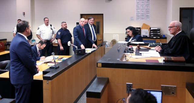 Suffolk County district attorney Ray Tierney, left, inside Judge Timothy Mazzei’s courtroom at Suffolk County Court in Riverhead on Tuesday, when alleged Gilgo Beach Killer Rex Heuermann was indicted in the death of Maureen Brainard-Barnes