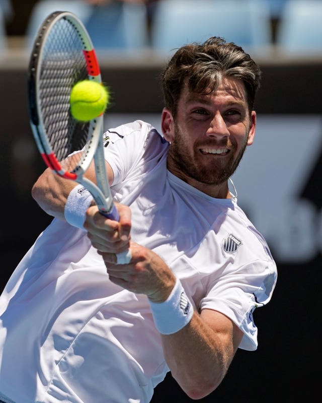 Cameron Norrie hits a backhand