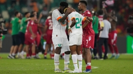 Franck Kessie, left, comforts team-mate Simon Adingra after Ivory Coast’s heavy defeat
