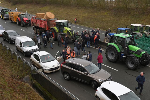 Farmers block a road during a demonstration near Beauvais in northern France 