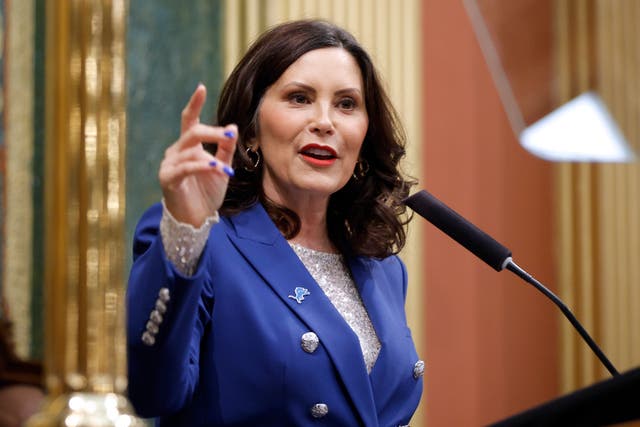 Gretchen Whitmer speaking into a microphone