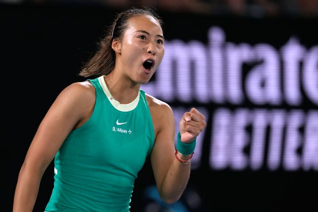 Zheng Qinwen celebrates winning a point against Anna Kalinskaya