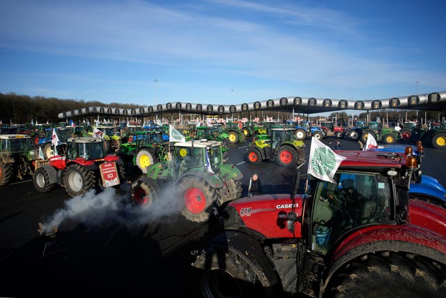 Convoys of farmers in tractors paralyse France’s roads in protest at ...
