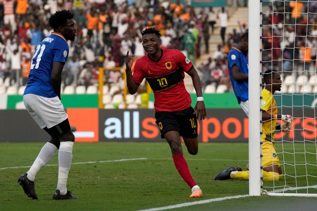Angola’s Gelson Dala celebrates after scoring