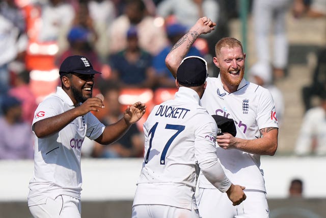 England captain Ben Stokes (right) celebrates with his side.