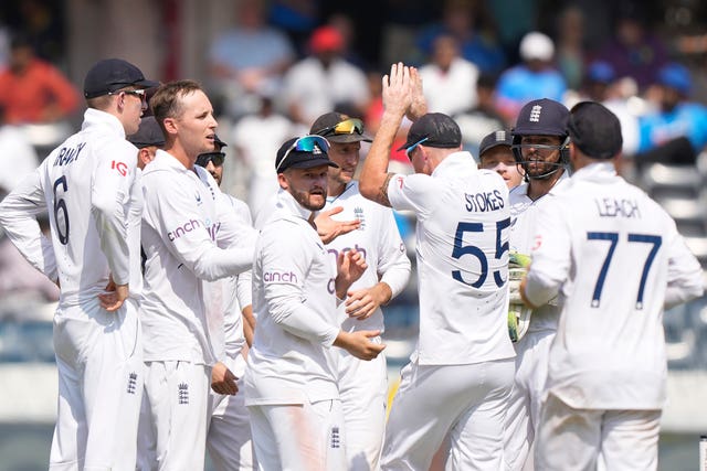 England’s players celebrate the wicket of India’s captain Rohit Sharma (Manesh Kumar A/AP)