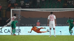 Cape Verde’s Ryan Mendes, left, scores the winning goal from the penalty spot (Sunday Alamba/AP)