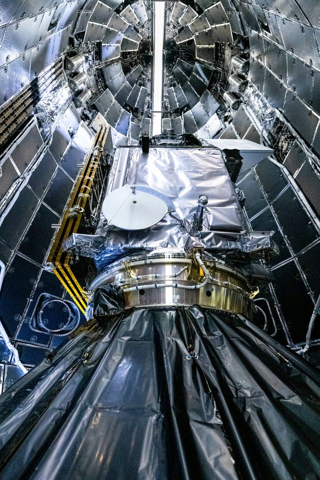 Nasa and SpaceX technicians encapsulating Nasa’s Pace spacecraft in SpaceX’s Falcon 9 payload fairings at the Astrotech Space Operations Facility near the agency’s Kennedy Space Centre in Florida