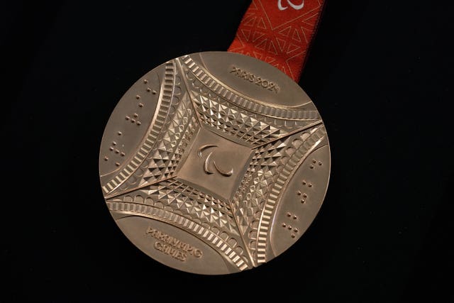 The Paris 2024 Paralympic bronze medal is presented to the press in Paris