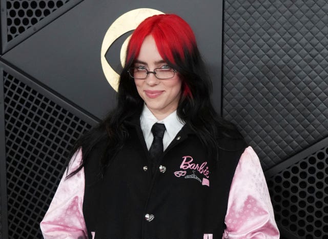 Billie Eilish, with red highlights in her hair, at the Grammys