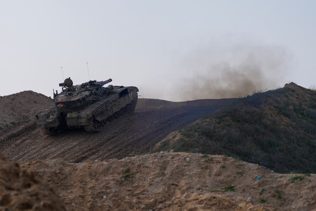 An Israeli tank in a position on the border with the Gaza Strip, as seen in southern Israel 