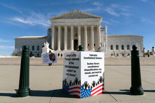 People protest outside the US Supreme Court in Washington
