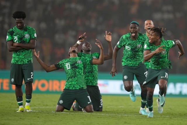Nigeria’s players celebrate winning the penalty shootout