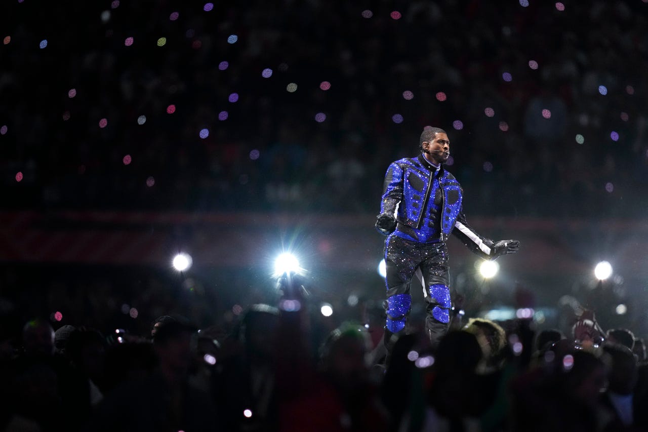 Usher performs hits at Super Bowl halftime show beside special guests