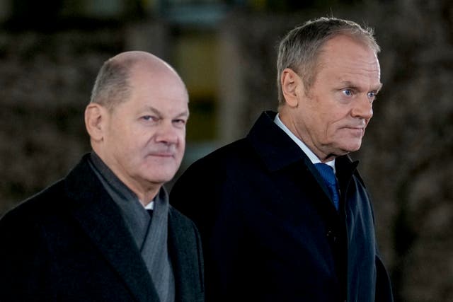 German chancellor Olaf Scholz, left, welcomes Poland’s Prime Minister Donald Tusk in Berlin, Germany (Ebrahim Noroozi/AP)