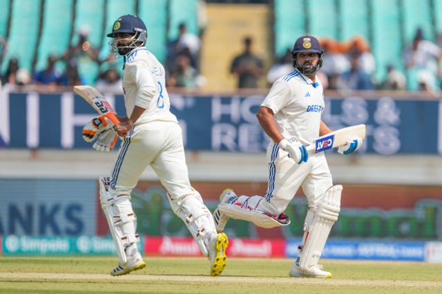 India captain Rohit Sharma (right) and Ravindra Jadeja run between the wickets
