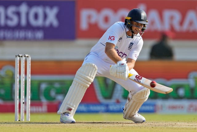 England’s Joe Root plays a reverse ramp shot in the third Test in Rajkot