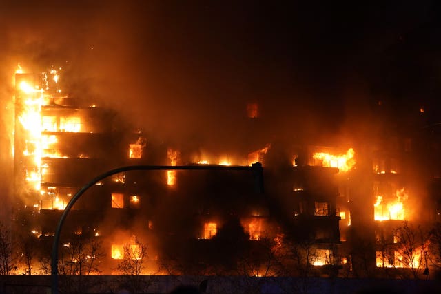 A housing block burns in Valencia, Spain