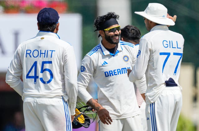 India’s Ravindra Jadeja, centre, celebrates the wicket of England captain Ben Stokes